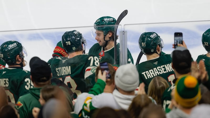 Quinn Hughes prêt à repousser la réunion avec ses frères