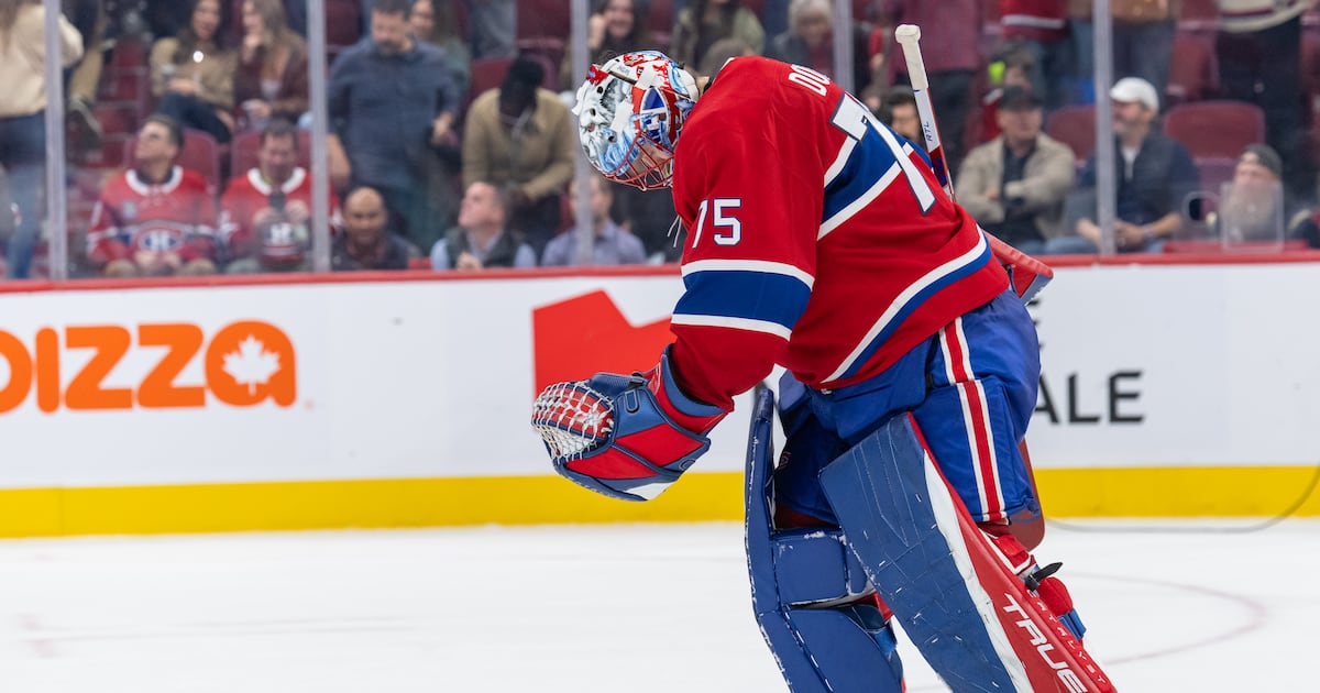 Photo: RDS MONTREAL, QC - OCTOBER 20: Jakub Dobes (75) of the Montréal Canadiens skates after the loss in (OT) period of the NHL game