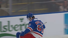 Woolley en ajoute et approche les Rangers du titre